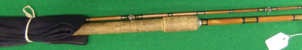 A "Tony Howell" two piece split cane carp rod,