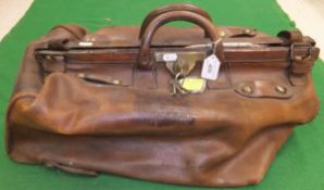 A circa 1900 leather Gladstone type bag of large proportions