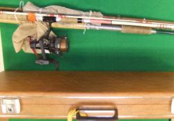 A collection of three assorted fishing rods to include one greenheart example,