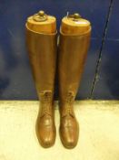 A pair of brown field boots with wooden trees CONDITION REPORTS Length of soles approx. 29 cm, boots