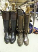 A pair of black leather hunting boots with wooden trees, and a pair of field boots CONDITION REPORTS
