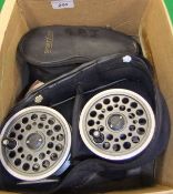 A collection of fly fishing reels to include a J W Young "1540" salmon fly reel with spare spool,