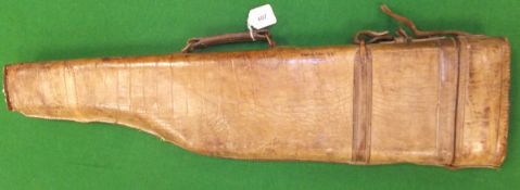 A crocodile skin leg o' mutton gun case