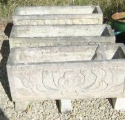 Three composite stone garden troughs