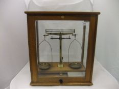 A beech cased set of Philip Harris Limited Birmingham balance scales