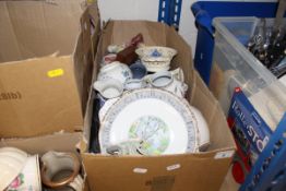 Seven boxes of assorted ornamental china wares, table lamps, dinner wares,