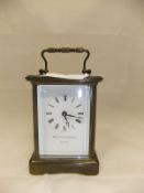 A four glass carriage brass carriage clock,