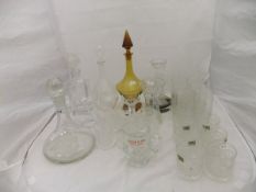 A collection of glassware to include a ship's decanter decorated with sailing vessel,