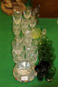 A collection of glassware to include a cut glass dump paperweight, cut glass tumblers,