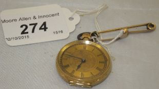 An 18 carat gold ladies pocket watch with Roman numerals and engraved floral dial and case,