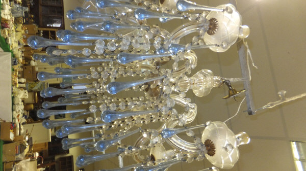 A Venetian style glass chandelier with clear cut glass swags and pale blue glass drops CONDITION - Image 3 of 6