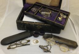 A pair of brass framed spectacles,