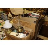 Three boxes of various metalwares to include copper and brass jugs, candlesticks, clocks,