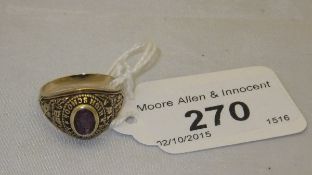 A 10 carat gold American College ring, set with purple stone bearing inscription "Ponca City High