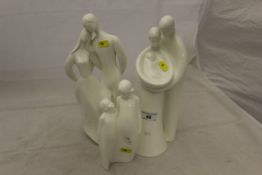 A collection of three Royal Doulton figures: "Lovers", HN2762, "Family",