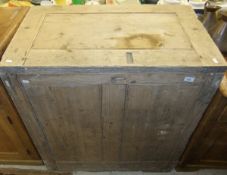 A Victorian pine grain chest with rising top over panelled sides