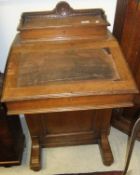 A late Victorian walnut Davenport desk