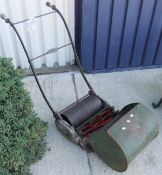 An Astral vintage push-along mower