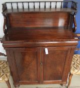 A late Regency mahogany chiffonier, the galleried top above a shelved superstructure on S scroll