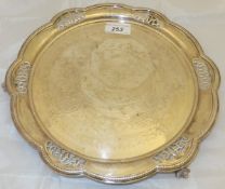 A Victorian silver salver with pierced decoration to rim and engraved decoration to centre,