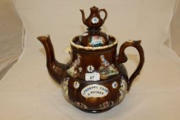 A Victorian bargeware teapot inscribed "A Present from a Friend"