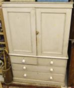 A 19th Century painted pine linen press, the two panelled doors over two short and three long