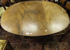A 19th Century mahogany drop leaf dining table,