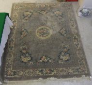 A Chinese superwash carpet, the central circular medallion in cream,