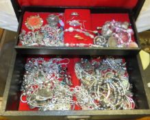 A jewellery box containing various costume jewellery to include Pilgrim necklace, various earrings,