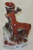 A 19th Century Staffordshire pottery spill vase with fox and goose decoration