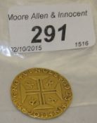 A 1703 Brazilian 4000 Reis coin CONDITION REPORTS Very irregular in shape around the edges. Some