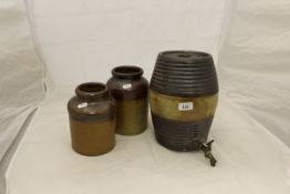 An 18th Century salt glazed stoneware ale barrel with original tap in bronze,