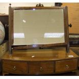 A 19th Century mahogany rectangular dressing table mirror raised on a stand of three drawers