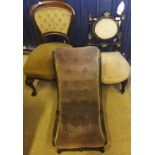 A late Victorian ebonised framed salon chair,