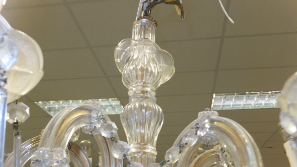 A Venetian style glass chandelier with clear cut glass swags and pale blue glass drops CONDITION - Image 2 of 6