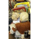 Two vintage dolls, a Merrythought bull plush toy, collection of old postcards,