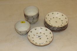 A set of five 19th Century New Hall style floral decorated tea bowls and saucers of wrythen design