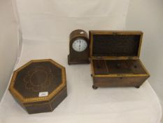 A 19th Century mahogany sarcophagus shaped tea caddy,