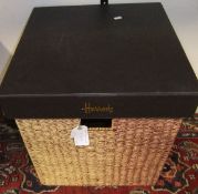 A Harrods cane work and brown leather covered box / stool