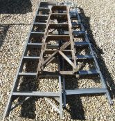Two aluminium folding step ladders and a wooden pair