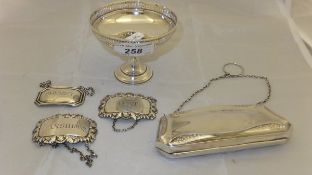 A George V silver sweetmeat bowl on pedestal base (Birmingham 1911), a silver evening purse,