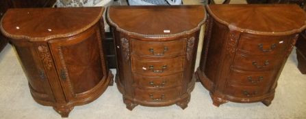 A pair of Kensington Hall Dutch style bedside chests of four drawers and a matching two door