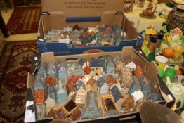 Two boxes of pottery model houses and other buildings