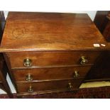 A 19th Century mahogany chest of three drawers with bass knob handles