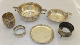 A twin-handled silver porringer bearing initials "J C A" to front (Birmingham 1929),