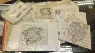 A folder of various maps of Worcestershire including one by T. Badeslade engraved by W.H.