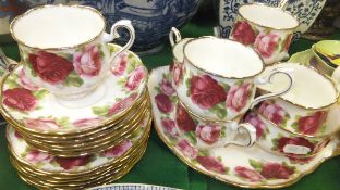 A Royal Albert "Old English Rose" teaset comprising 6 cups, saucers and side plates, a cake plate,