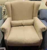 A modern upholstered wing back scroll arm chair in the Georgian manner,