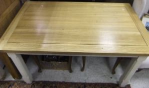 A modern rectangular Shaker style light oak topped kitchen table with cream painted legs