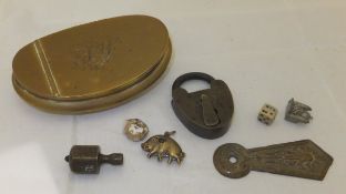 A brass snuff tin with engraved initials, a Victorian brass padlock, etc.